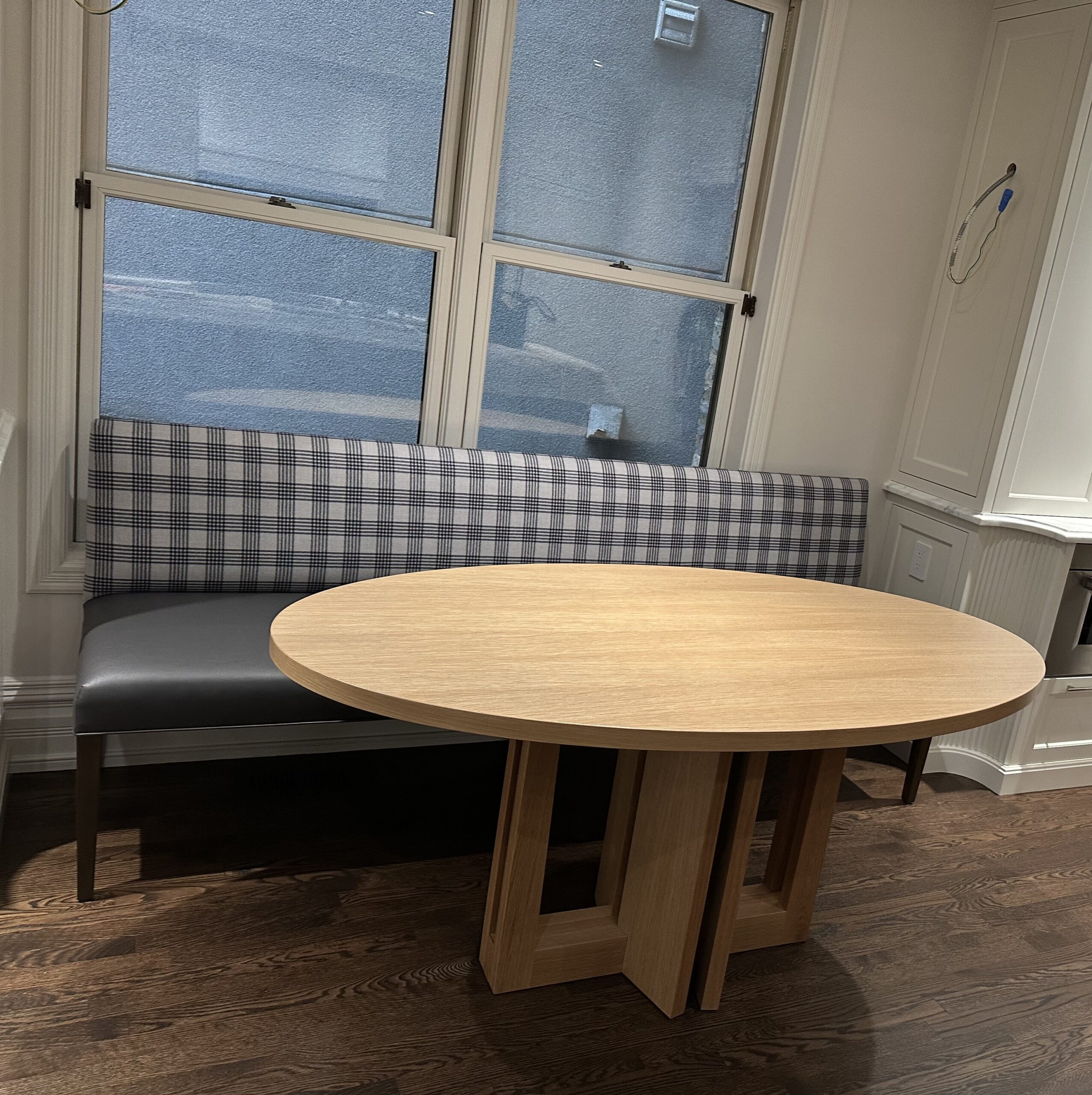 Custom Banquette and Dining Table Designed by Kate Taylor Interiors